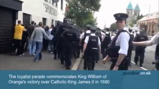 Orangemen parade through Belfasts Ardoyne district [upl. by Bracci247]