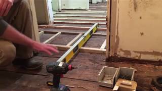 DIY How to level a uneven wavy or sloping wood floor [upl. by Ahsaet]