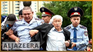 Kazakhstan police and protesters clash after poll [upl. by Niletak]