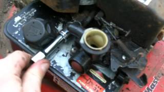 Briggs and Stratton air filter cleaning [upl. by Abbottson]