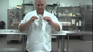 The Chefs Academy How to tie a neckerchief [upl. by Hershel101]