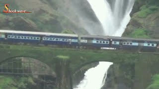 Train crossing through Dudhsagar waterfall Goa in monsoon Aug 092017  shock wave [upl. by Noslen]