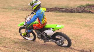 MXTV Bike Review  Kawasaki KLX 140L [upl. by Aerdnna]