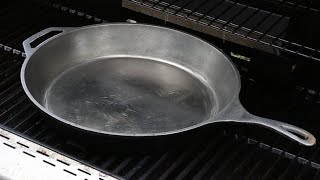 Smoothing and reseasoning a new cast iron pan [upl. by Airbmat]