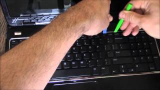 How To Remove The Keyboard On A Dell Laptop Computer [upl. by Eilyr]