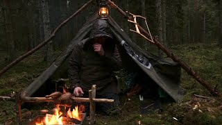 Caught in a Storm  4 days solo bushcraft camping in heavy rain portable wood stove canvas tent [upl. by Nolyarg]