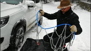 How to fit amp remove snow tire chains Thule König XG12 Pro [upl. by Ienttirb502]