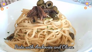 Italian dish Pasta with anchovy fillets and green olives [upl. by Hobbie]