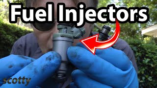 How to Replace Fuel Injectors in Your Car [upl. by Suilenroc]