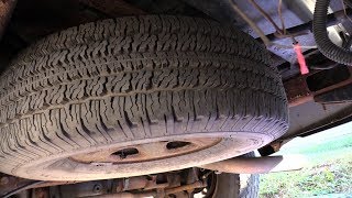 How to Remove Spare Tire from Underneath Trucks Vans and Pickups [upl. by Pilihp]