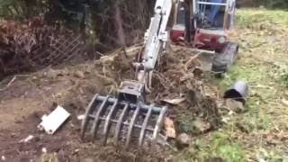 Takeuchi TB016 Land Rake by Evans amp Reid [upl. by Jarita]