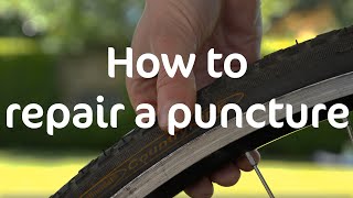 How to repair a puncture  Cycling UK [upl. by Eedoj]